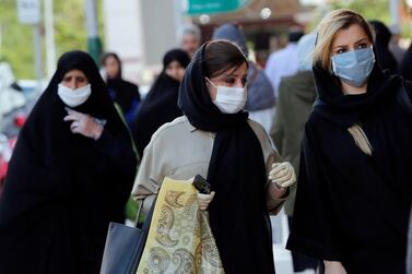 Iranian women wearing face masks and protective gloves go shopping in a street, in Tehran, Iran, 7 May 2020. Media reported that Iran is one of the most affected countries by Covid-19 disease. EPA