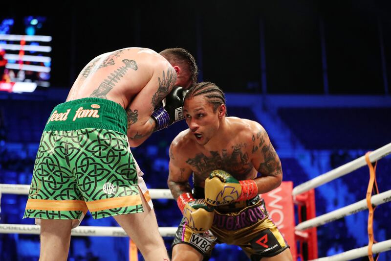 Regis Prograis and Tyrone McKenna during their super lightweight bout. 