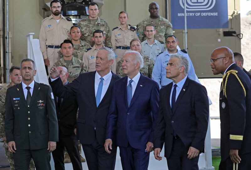 US President Joe Biden, third right, and Israeli Defence Minister Benny Gantz, second left, tour Israel's Iron Beam defence system at Ben Gurion Airport near Tel Aviv with Prime Minister Yair Lapid, second right, Israeli army Chief of Staff Aviv Kohavi, left, and US Defence Attache in Israel, Brig Gen Shawn Harris, right. EPA