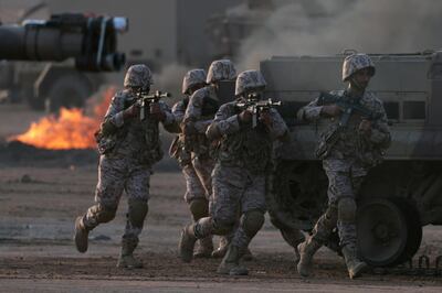 Members of the United Arab Emirates Armed Forces perform military drills during the "Union Fortress 6" military parade in Al Hamra, Ras al Khaimah, United Arab Emirates November 1, 2019. REUTERS/Christopher Pike