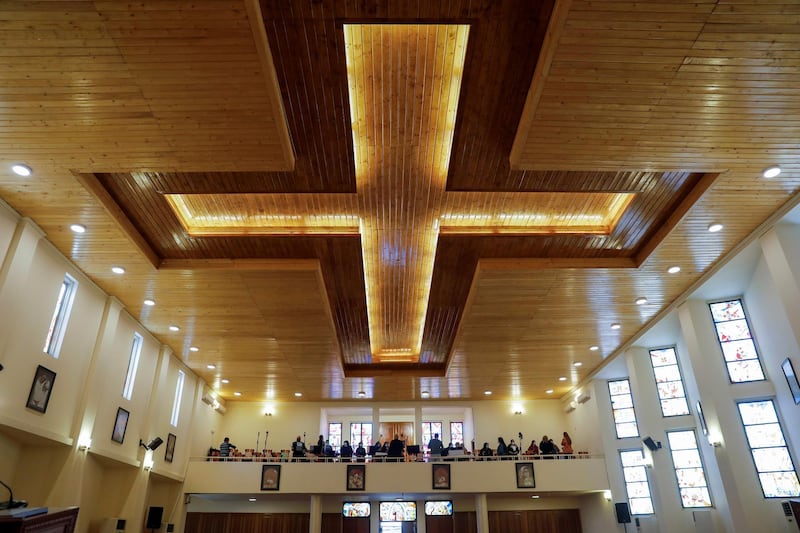 Choir members practise at St Joseph Chaldean Cathedral, where Pope Francis will hold a mass, in Baghdad. Reuters