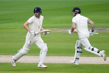 MANCHESTER, ENGLAND - JULY 16: Dom Sibley and Ben Stokes of England make runs during Day One of the 2nd Test Match in the #RaiseTheBat Series between England and The West Indies at Emirates Old Trafford on July 16, 2020 in Manchester, England. (Photo by Gareth Copley/Getty Images for ECB)