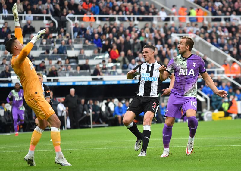 Tottenham's Harry Kane lobs the ball over Newcastle goalkeeper Karl Darlow to make it 2-1. EPA