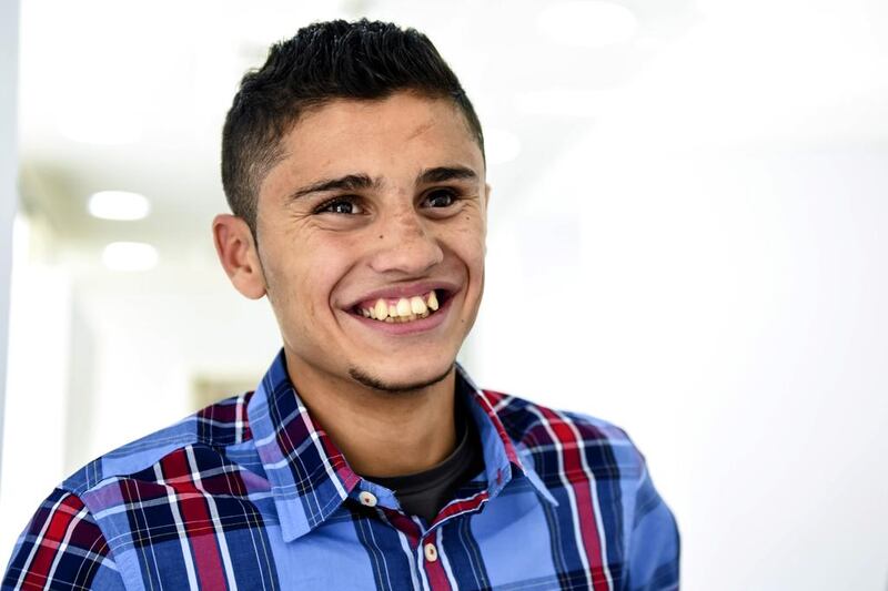 Mamoon Qabha, 17, who lost an eye as a result of an accident as a child, recently visited Dubai where he was fitted with an artificial eye at Moorfields Eye Hospital. Courtesy Palestine Children’s Relief Fund