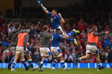 CARDIFF, WALES - MARCH 19: Italy centre Juan Ignacio Brex is lifted high by Toa Halafihi during the celebrations after the Six Nations Rugby match between Wales and Italy at Principality Stadium on March 19, 2022 in Cardiff, Wales. (Photo by Stu Forster / Getty Images)