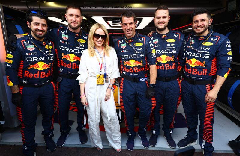 Singer Kylie Minogue in the Red Bull garage in Monaco. Getty