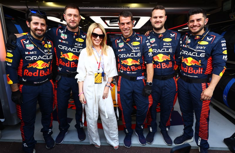 Singer Kylie Minogue in the Red Bull garage in Monaco. Getty