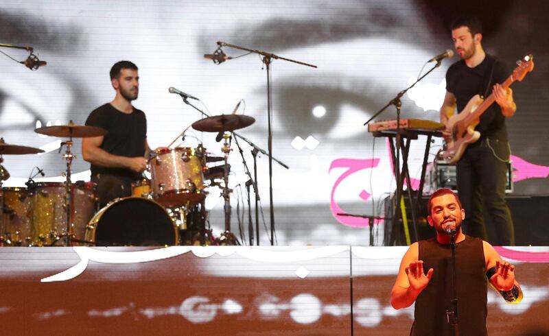 Hamed Sinno (R), the lead singer of Lebanese band Mashrou Leila, performs on stage at the Dubai International Marine Club during a music festival in the United Arab Emirates, on April, 7, 2017. - Arab artists not traditionally considered mainstream are gaining growing recognition both at home and across the globe. Bands like Lebanon's Mashrou' Leila and Jordan's Autostrad, hip-hop artists like Iraqi-Canadian Narcy and Palestinian Muqata3a, along with solo acts like Yasmine Hamdan, are at the head of the movement.
Autostrad, Narcy and Mashrou' Leila headlined the April 7 closing night of Dubai's STEP 2017 conference, an annual technology, digital and entertainment festival. (Photo by KARIM SAHIB / AFP)