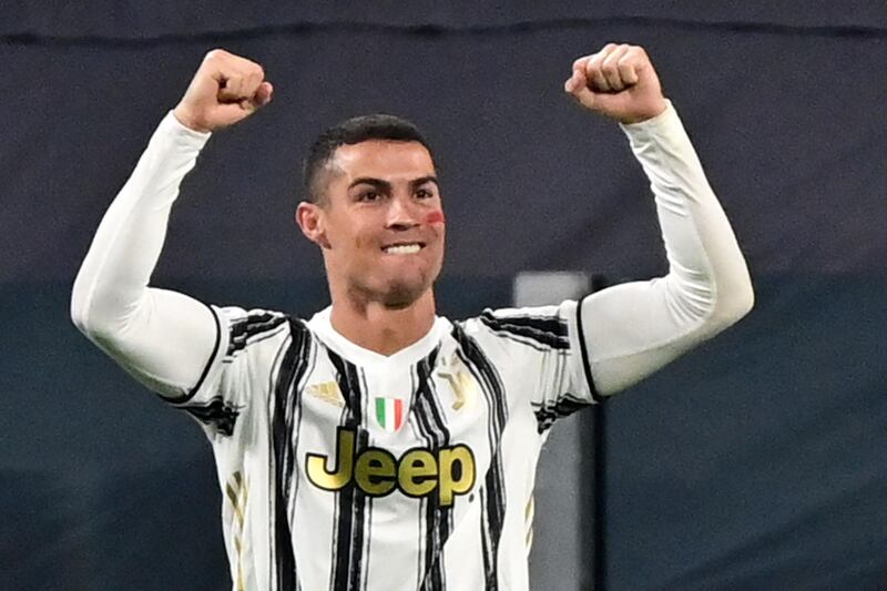 Cristiano Ronaldo celebrates after scoring his second goal against Cagliari. AFP