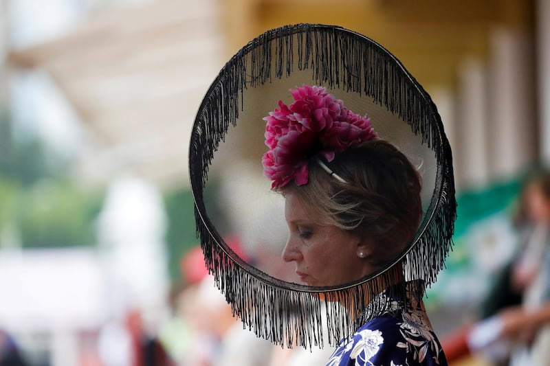 A woman looks on during the Grand Prix Radio Monte Carlo horse races in Moscow, Russia.  Reuters