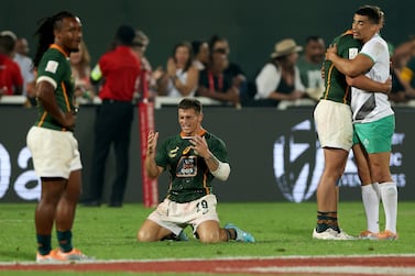 DUBAI, UNITED ARAB EMIRATES - DECEMBER 03: Ricardo Duarttee of South Africa reacts after winning the Men's Cup Final match between South Africa and Ireland on Day Two of the HSBC World Rugby Sevens Series - Dubai at The Sevens Stadium on December 03, 2022 in Dubai, United Arab Emirates. (Photo by Christopher Pike / Getty Images)