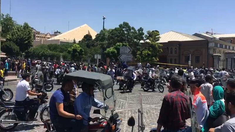 An image grab taken from AFP TV shows the scene outside the mausoleum of Ayatollah Ruhollah Khomeini after the bomb attack. AFP TV