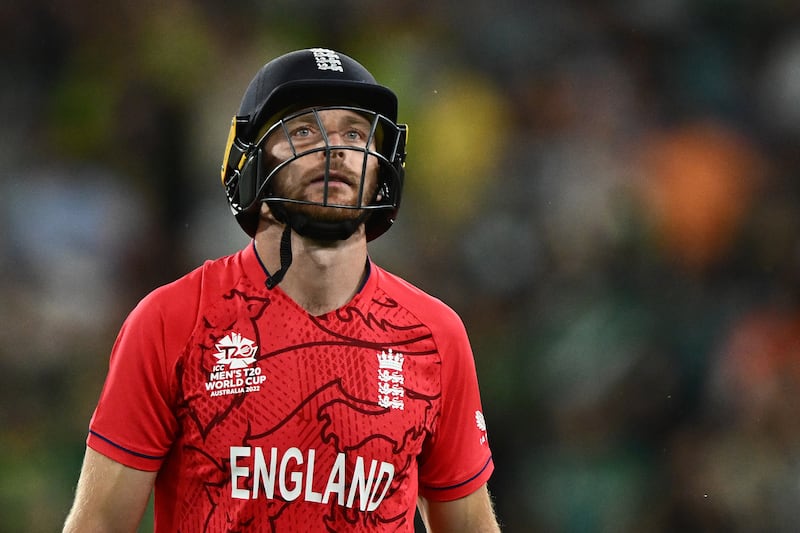 Jos Buttler of England leaves the field after being dismissed. EPA 