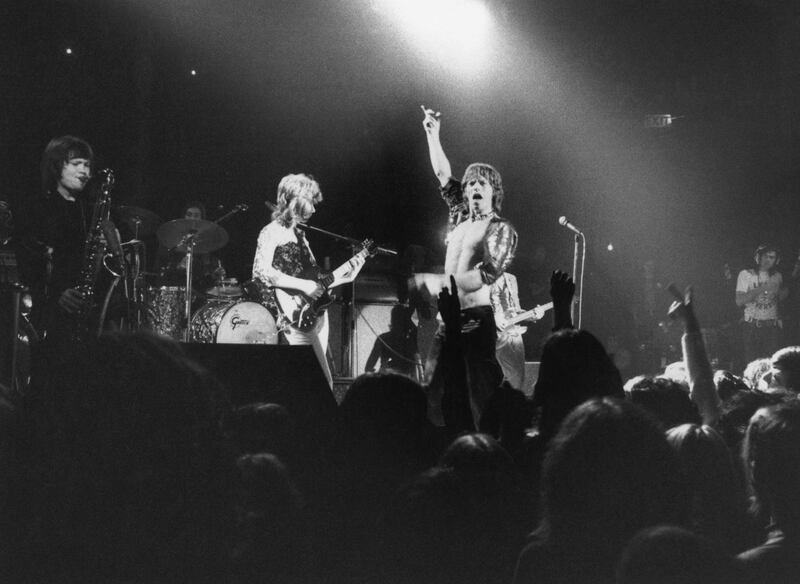 The Rolling Stones perform at the Roundhouse, London, 14th March 1971. The band features Bobby Keys on saxophone, left, and Mick Taylor on guitar, centre. (Photo by Evening Standard/Hulton Archive/Getty Images)   