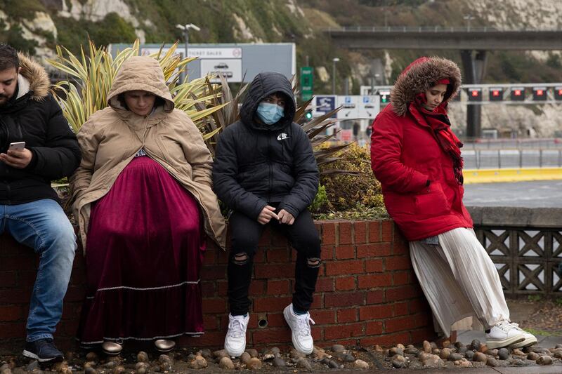 DOVER, ENGLAND - DECEMBER 23: Travellers to Europe wait at the Port of Dover on December 23, 2020 in Dover, United Kingdom. Nearly 3,000 lorries were stranded around Kent after France banned all travel from the UK on Sunday, citing concerns over a new variant of covid-19. Late Tuesday, the countries reached a deal to restart freight travel for drivers with a recent negative covid-19 test.  (Photo by Dan Kitwood/Getty Images)
