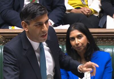 UK Home Secretary Suella Braverman listens as Prime Minister Rishi Sunak speaks in the House of Commons in London this month. AFP