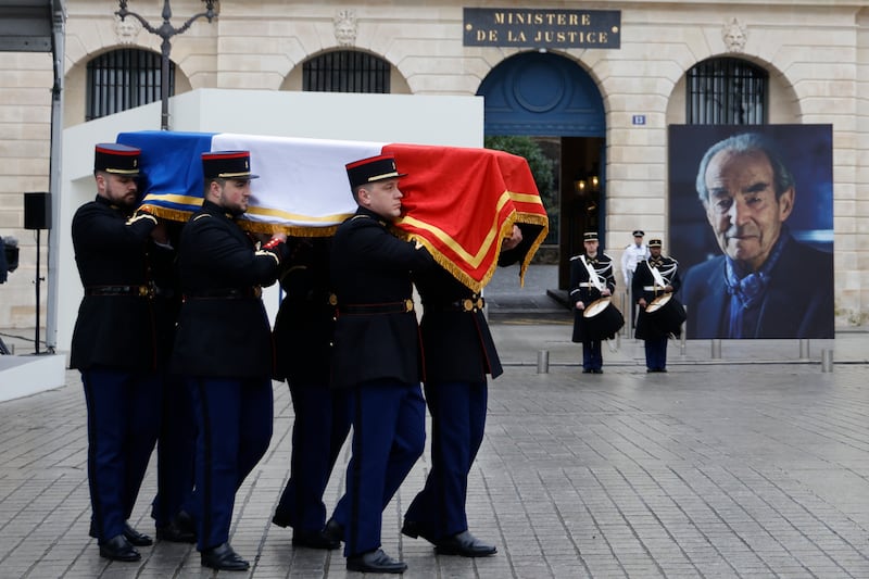 Republican Guards carry the coffin of former French justice minister Robert Badinter during a tribute ceremony in his honour in Paris, France. EPA 
