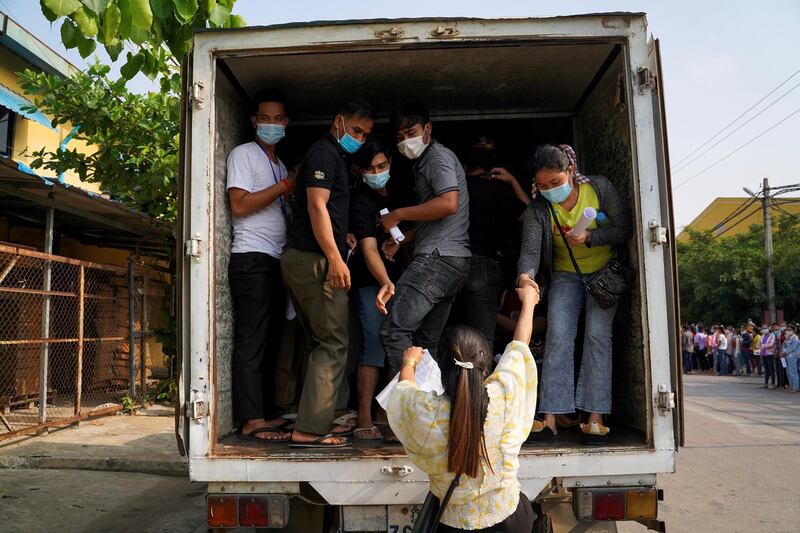 Garment factory workers and staff arrive to receive China's Sinovac coronavirus vaccine at an industrial park in Phnom Penh, Cambodia. Reuters