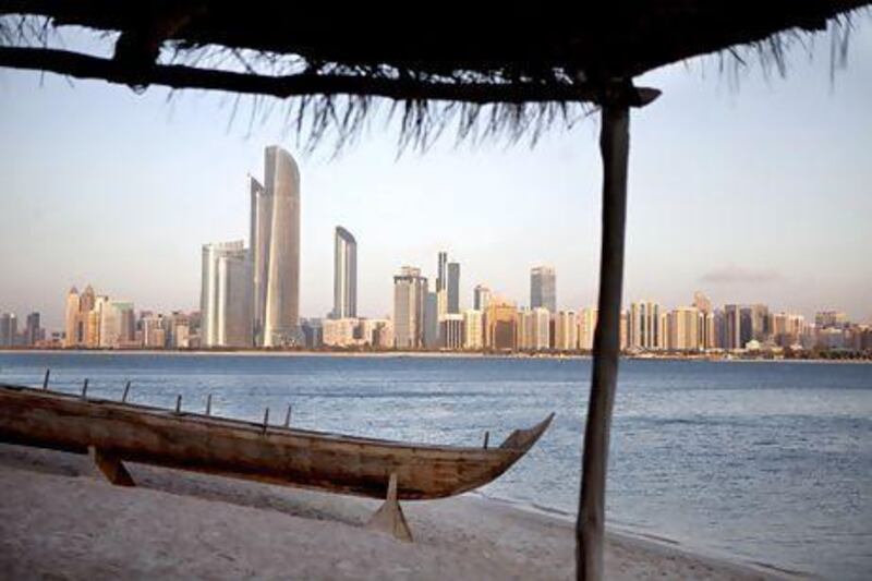 Rents for older flats and offices in Abu Dhabi's city centre are set to fall further as thousands of new homes and offices enter the market. Silvia Razgova / The National