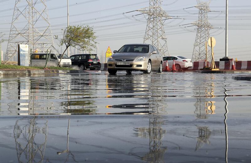 DUBAI , UNITED ARAB EMIRATES , JAN 09 – 2018 :- Water logging because of last night rain at street 8 in Discovery Gardens area in Dubai.  (Pawan Singh / The National) For News. 