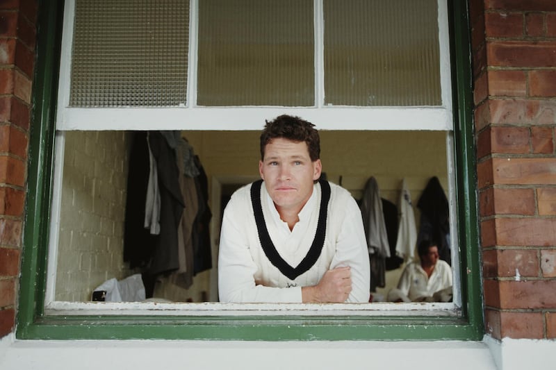 DURHAM, ENGLAND - APRIL 01:  Durham, Victoria and Australia batsman Dean Jones pictured looking out of the Pavillion window at the Racecourse ground circa 1991 in Durham, United Kingdom. (Photo by Chris Cole/Allsport/Getty Images/Hulton Archive)