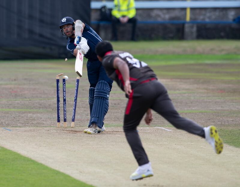 Scotland's Kyle Coetzer is bowled by Junaid Siddique for a disappointing 10 runs.