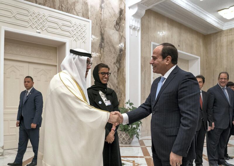 CAIRO, EGYPT - April 10, 2018: HE Abdel Fattah El Sisi President of Egypt (R) greets HE Abdul Rahman Mohamed Al Owais, UAE Minister of Health and Prevention (L), at Heliopolis Palace, during an official visit. Seen with HE Noura Mohamed Al Kaabi, UAE Minister of Culture and Knowledge Development (2nd L).

( Mohamed Al Hammadi / Crown Prince Court - Abu Dhabi )