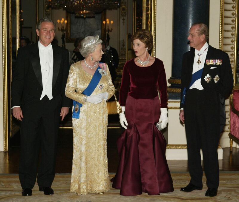 LONDON - NOVEMBER 19:  (NO UK SALES FOR 28 DAYS) HRH Queen Elizabeth II (2nd from L), U.S. President George W. Bush (L), First Lady Laura Bush and HRH the Duke of Edinburgh pose in the music room at Buckingham Palace on November 19, 2003 in London. The Queen was hosting a State Banquet at the Palace for the President and his wife, on the first official day of his 3-day visit to Britain. (Photo Royal Rota/Getty Images)