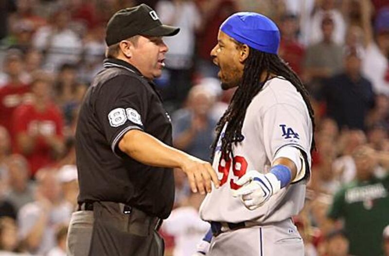 Manny Ramirez argues with home plate umpire Doug Eddings after being ejected against the Arizona Diamondbacks.