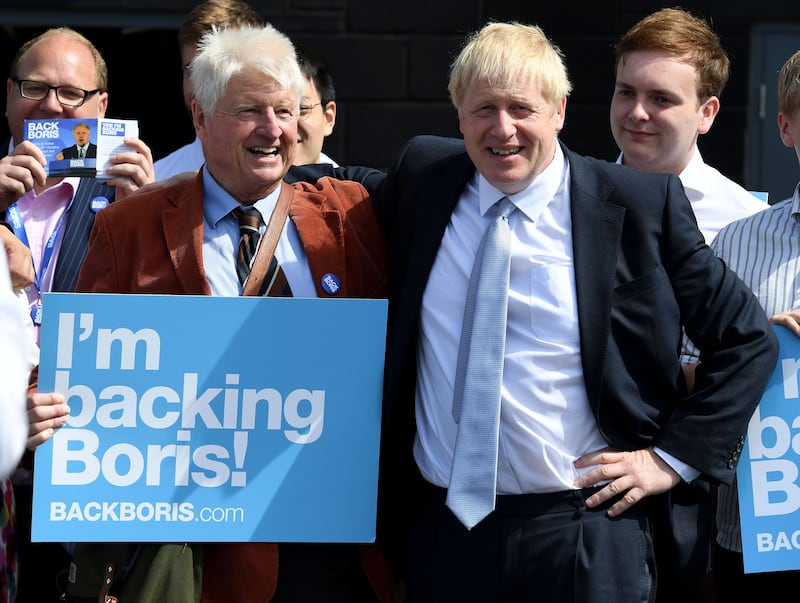 Boris Johnson, right, is believed to have nominated his father Stanley for a knighthood. Getty