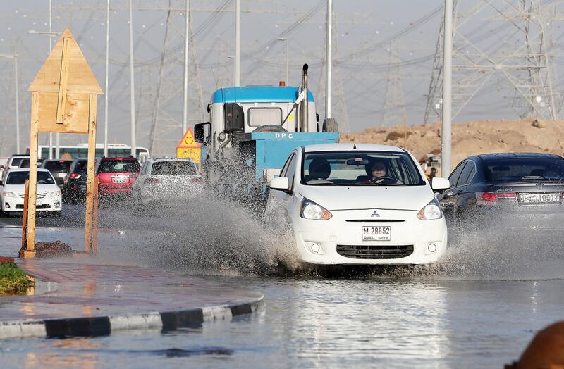 
DUBAI , UNITED ARAB EMIRATES , JAN 09 – 2018 :- Water logging because of last night rain at street 8 in Discovery Gardens area in Dubai.  (Pawan Singh / The National) For News. 
