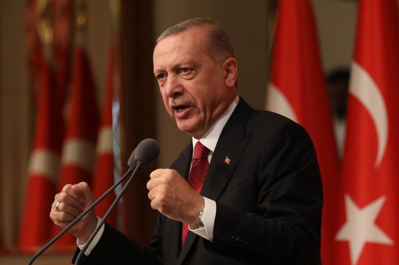 Turkish President Tayyip Erdogan delivers a speech during a ceremony marking the second anniversary of the attempted coup at the Presidential Palace in Ankara, Turkey, on July 15, 2018. / AFP / ADEM ALTAN
