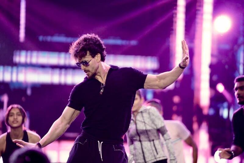 Bollywood star Tiger Shroff rehearses on stage at the Etihad Arena.