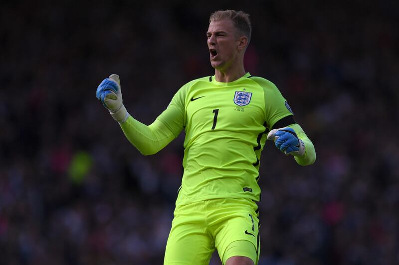 England's goalkeeper Joe Hart celebrates their late equalizer during the group F World Cup qualifying football match between Scotland and England at Hampden Park in Glasgow on June 10, 2017.
The game ended 2-2. / AFP PHOTO / Paul ELLIS / NOT FOR MARKETING OR ADVERTISING USE / RESTRICTED TO EDITORIAL USE 