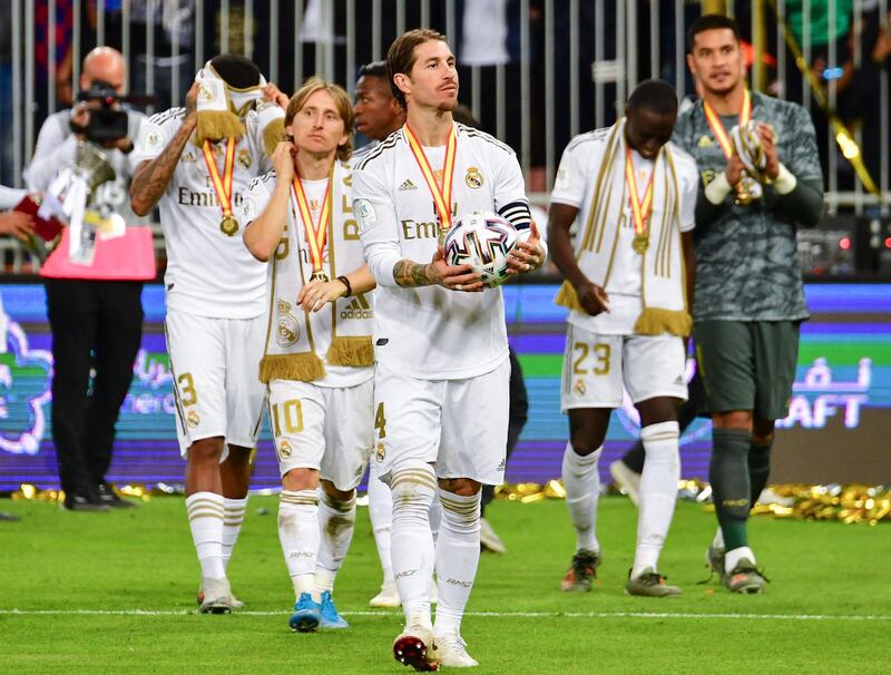 Real Madrid's Spanish defender Sergio Ramos and teammates celebrate after the match.  AFP