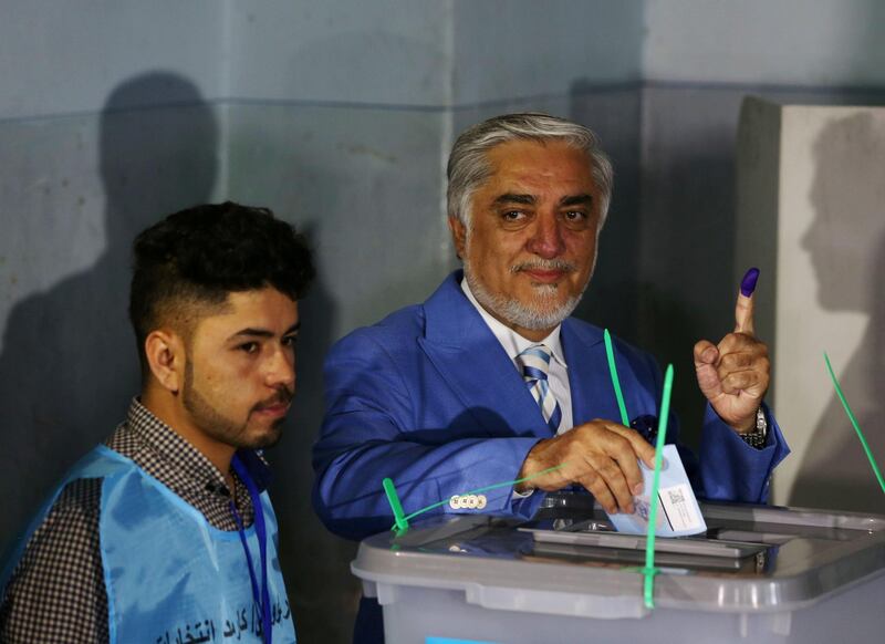 Afghan presidential candidate Abdullah Abdullah casts his vote at a polling station in Kabul, Afghanistan. Reuters