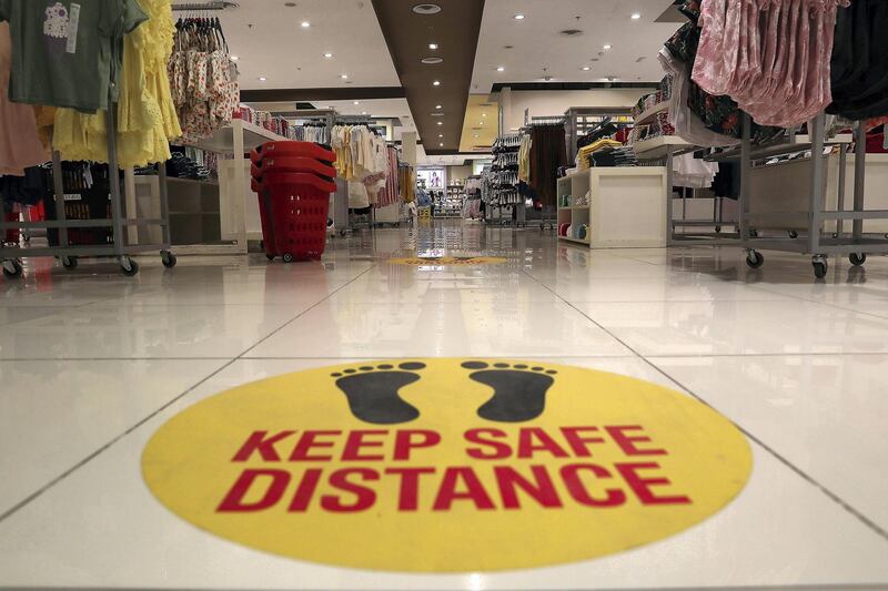 RAK, UNITED ARAB EMIRATES , May 28 – 2020 :- Safety stickers at the Redtag store at the Al Naeem City Center in Ras Al Khaimah. UAE government lift the coronavirus restriction for the residents and businesses around the country. (Pawan Singh / The National) For News/Online/Stock/Instagram. 