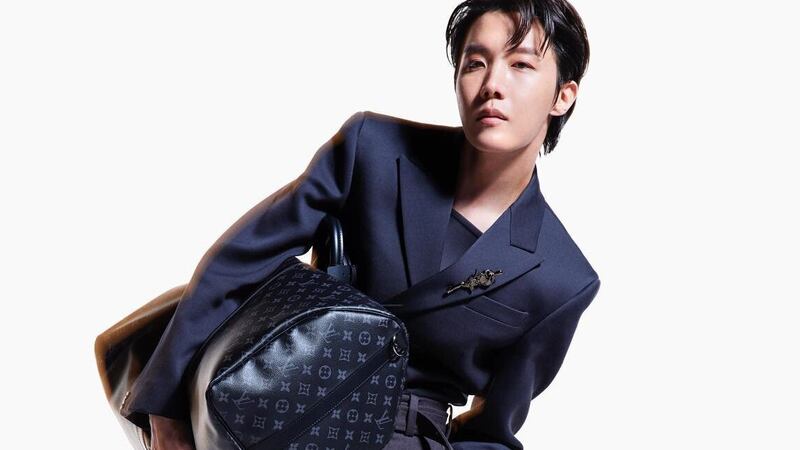 J-Hope sports one of Louis Vuitton's best-known bags, the Keepall. Photo: Louis Vuitton