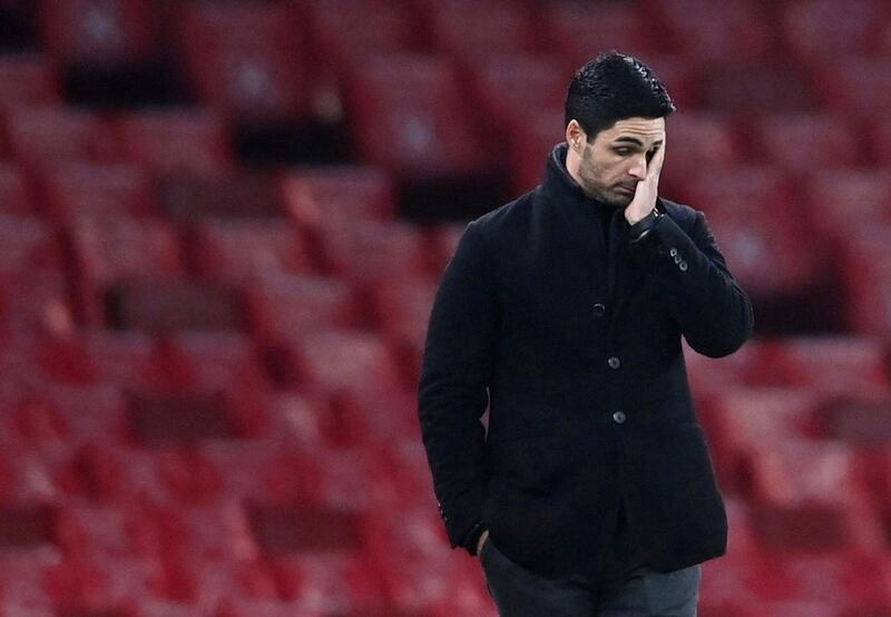 Soccer Football - Premier League - Arsenal v Burnley - Emirates Stadium, London, Britain - December 13, 2020 Arsenal manager Mikel Arteta reacts Pool via REUTERS/Laurence Griffiths EDITORIAL USE ONLY. No use with unauthorized audio, video, data, fixture lists, club/league logos or 'live' services. Online in-match use limited to 75 images, no video emulation. No use in betting, games or single club /league/player publications.  Please contact your account representative for further details.     TPX IMAGES OF THE DAY