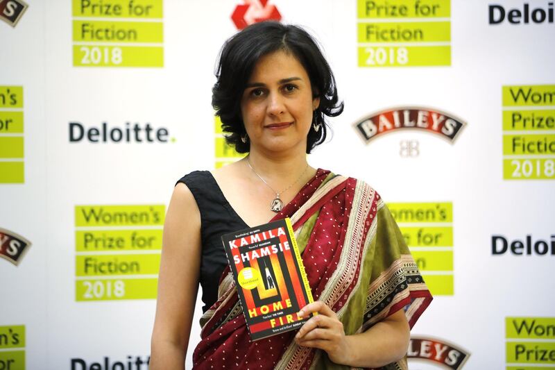 Britain's Kamila Shamsie, one of the shortlisted authors for the Women's Prize for Fiction poses in London on June 6, 2018. / AFP / Tolga AKMEN
