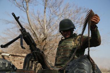 An Afghan army soldier stands guard at a check point in Nangarhar province, Afghanistan in February 2020. EPA
