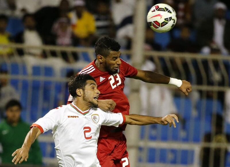 Mohammed Juma and Oman’s Mohammed Al Musalame. AFP