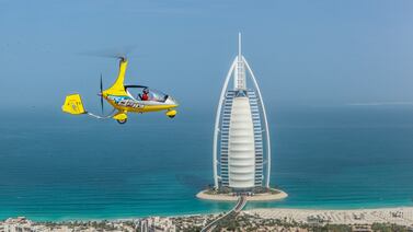 Fly over Dubai this summer on a discounted gyrocopter flight. Photo: Skydive Dubai