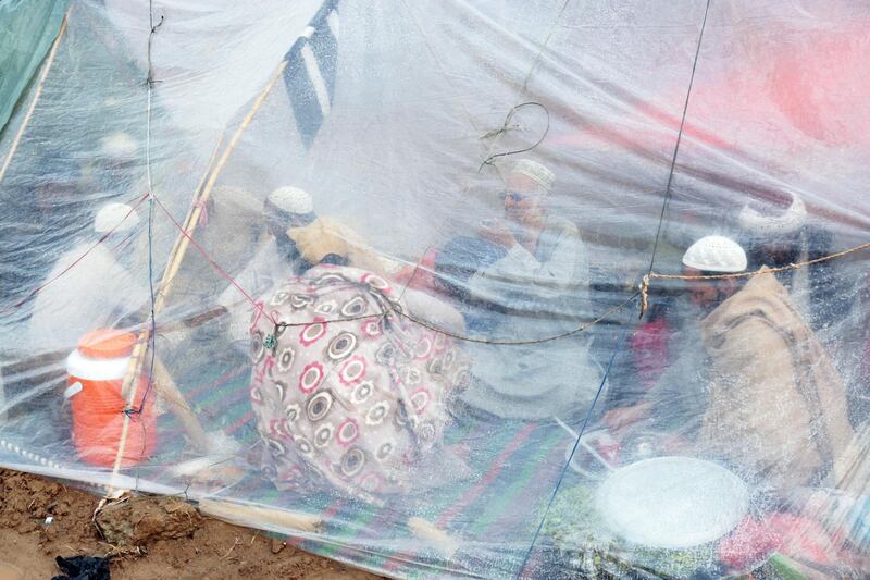 Supporters take shelters in a camp. EPA