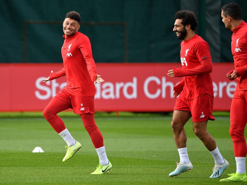 Left to right: Alex Oxlade-Chamberlain, Mohamed Salah and Dejan Lovren. AFP