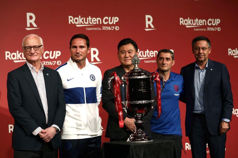From left: Chelsea chairman Bruce Buck, manager Frank Lampard, Japanese Rakuten company president and CEO Hiroshi Mikitani, Barcelona manager Ernesto Valverde and president of FC Barcelona Josep Maria Bartomeu pose with the Rakuten Cup. AFP