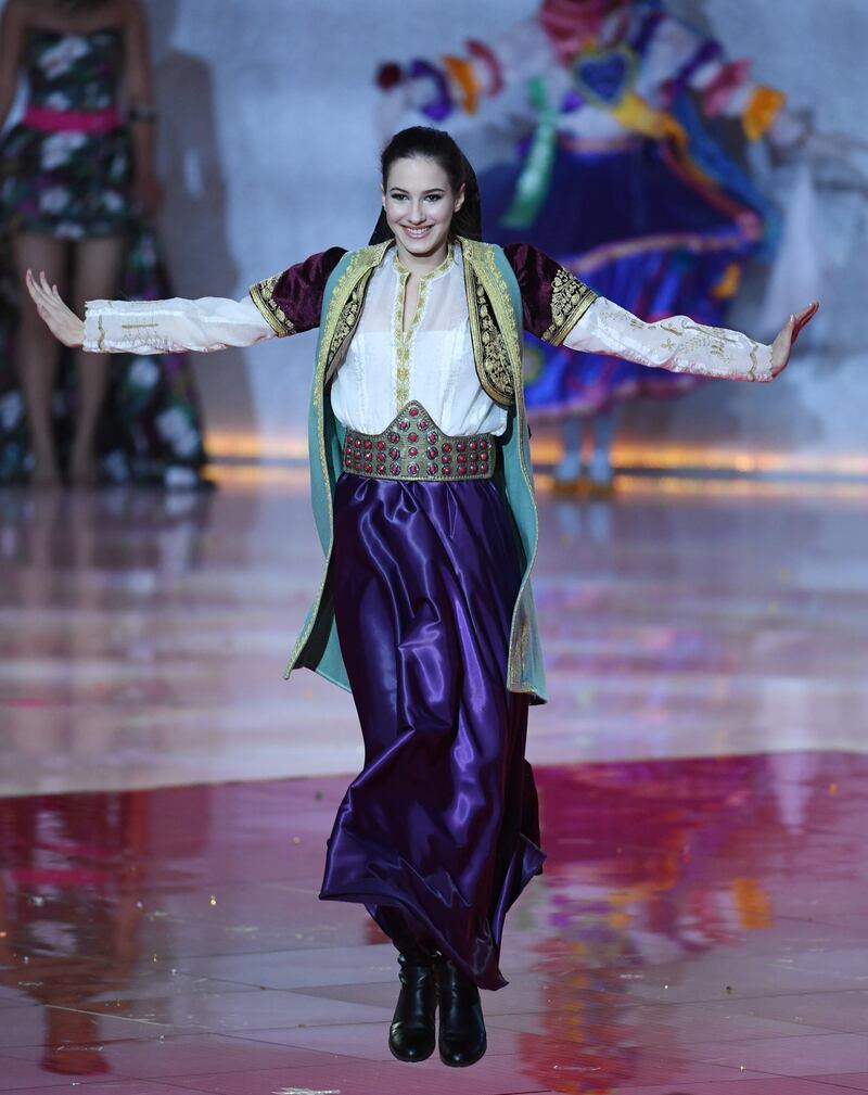 Miss Montenegro Mirjana Muratovic performs during the Miss World 2019 final in the ExCel centre in London.  EPA