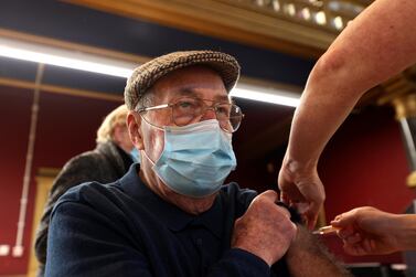 A man receives a dose of Covid-19 vaccine at a community vaccination centre at Hartlepool Town Hall. Reuters 