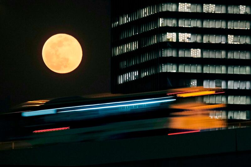 The pink supermoon provides an excellent opportunity for moon-viewing in Tokyo, Japan.  AFP