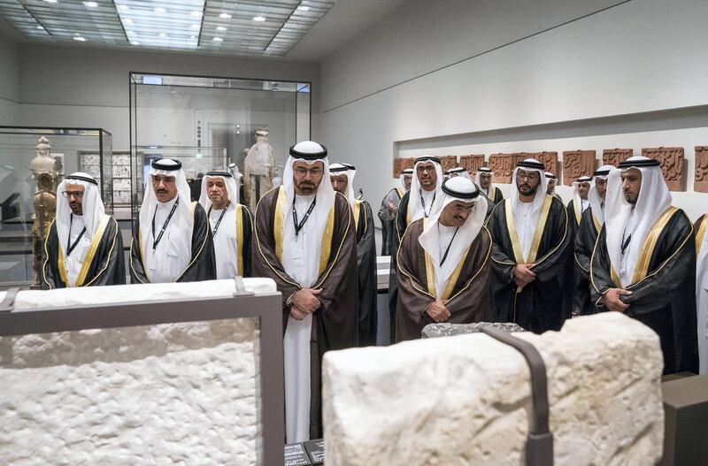 SAADIYAT ISLAND, ABU DHABI, UNITED ARAB EMIRATES - November 08, 2017: (L-R) HE Dr Ali Rashid Al Nuaimi, Director General of Abu Dhabi Education Council and Abu Dhabi Executive Council Member, HE Ahmed Juma Al Zaabi, UAE Deputy Minister of Presidential Affairs, HE Mohamed Abdulla Al Gergawi, UAE Minister of Cabinet Affairs and the Future, HE Dr Abdullah bin Mohamed Al Nuaimi, UAE Minister of Infrastructural Development, HH Sheikh Ahmed bin Hamdan bin Mohamed Al Nahyan, and HE Sheikh Abdulla bin Mohamed Al Hamed, Chairman of the Health Department and Abu Dhabi Executive Council Member, tour the Louvre Abu Dhabi, during the opening ceremony.


( Hamad Al Kaabi / Crown Prince Court - Abu Dhabi )
—